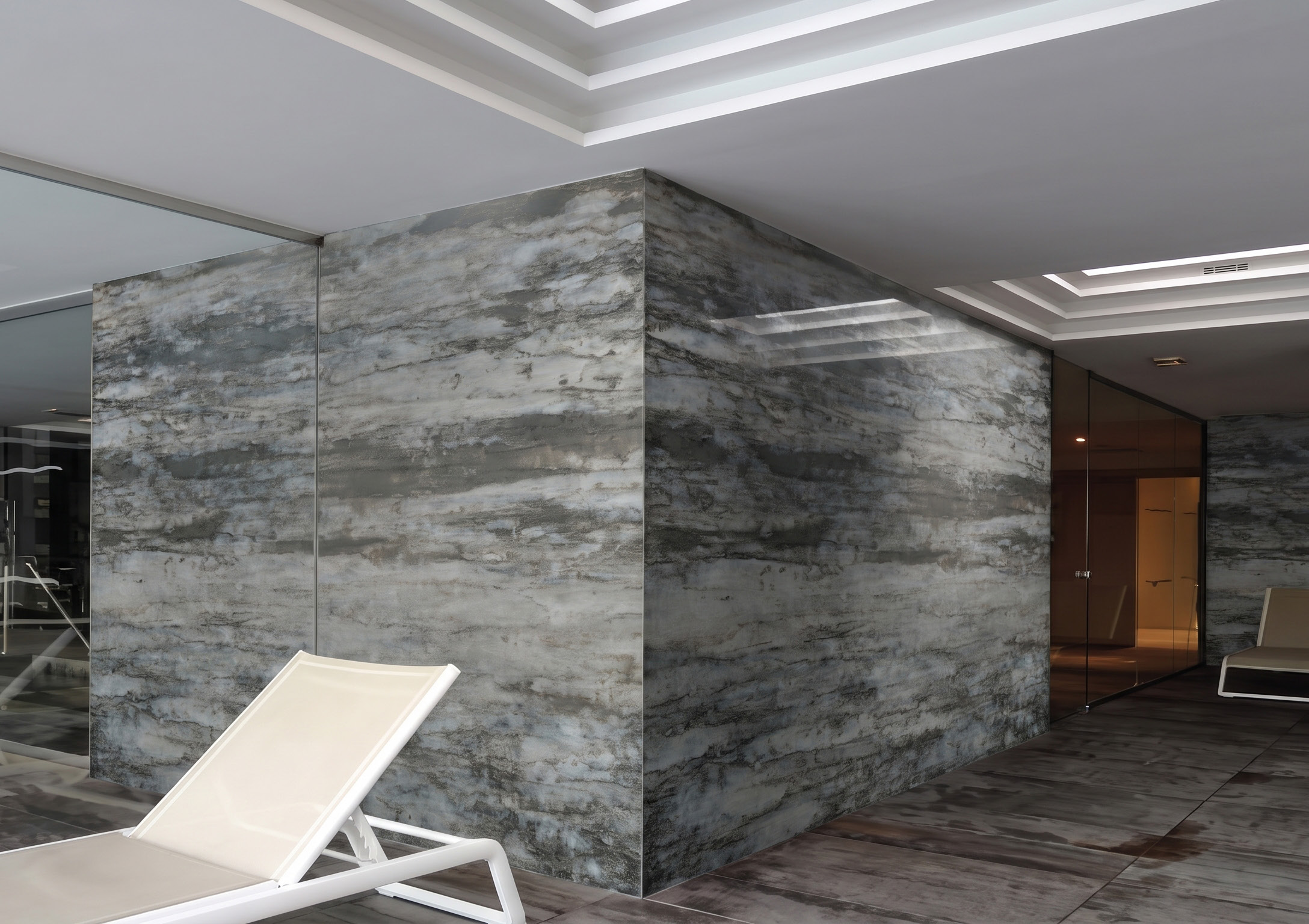 A wellness area clad in a grey stone pattern