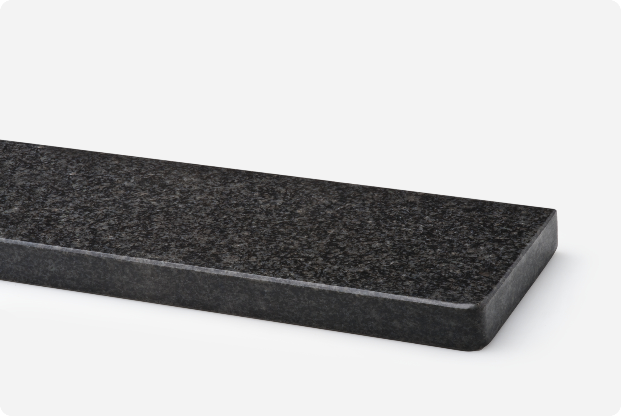 A black granite window sill
