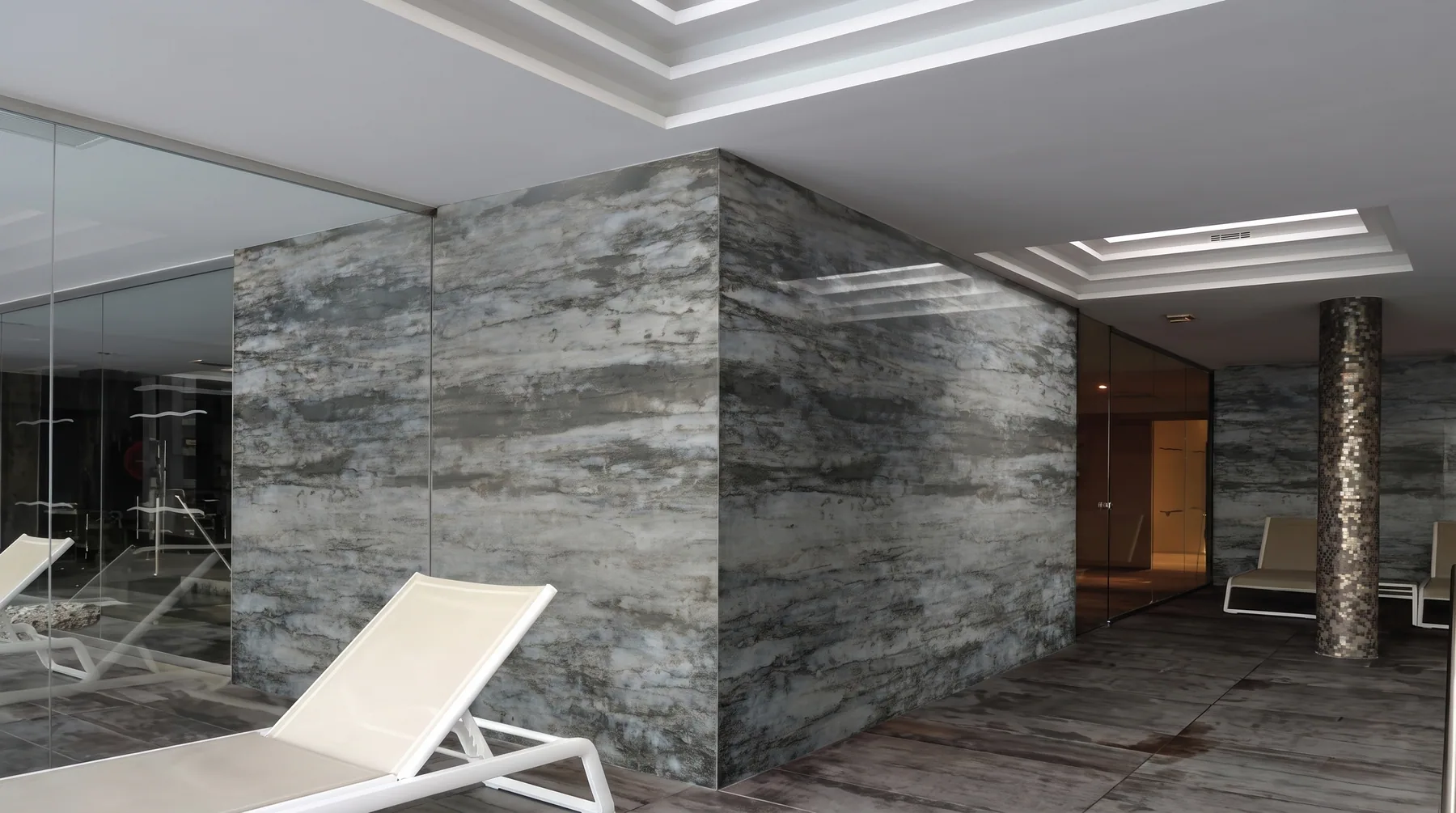 A stone-clad interior wall in Ruskin