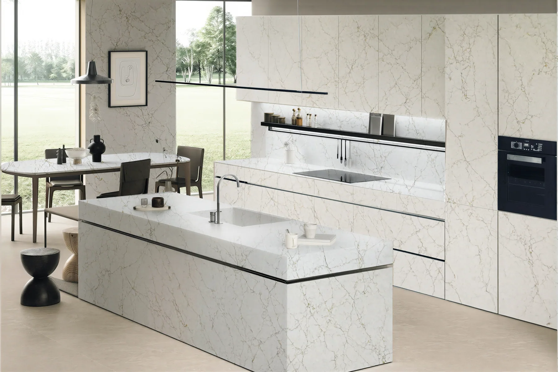 A kitchen with a quartz island and matching wall cabinets